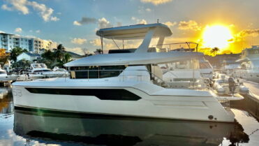 Premium Captains Yacht Train on Power Catamaran at the dock